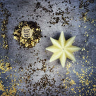 Yellow beeswax Mystic Star spell candle by Parlour of Wonders for manifestation and spiritual magic, featuring a star shape design.