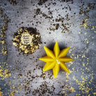 Yellow beeswax Mystic Star spell candle by Parlour of Wonders, used for manifestation and spiritual power magic.