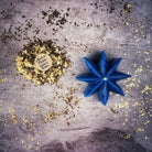 Yellow beeswax Mystic Star Spell Candle by Parlour of Wonders for manifestation and spiritual power magic.