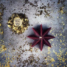 Yellow beeswax Mystic Star Spell Candle by Parlour of Wonders, used for manifestation and spiritual power magic.
