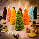 Yellow beeswax cone of coins spell candle by Parlour of Wonders, designed for money magnet and prosperity magic.