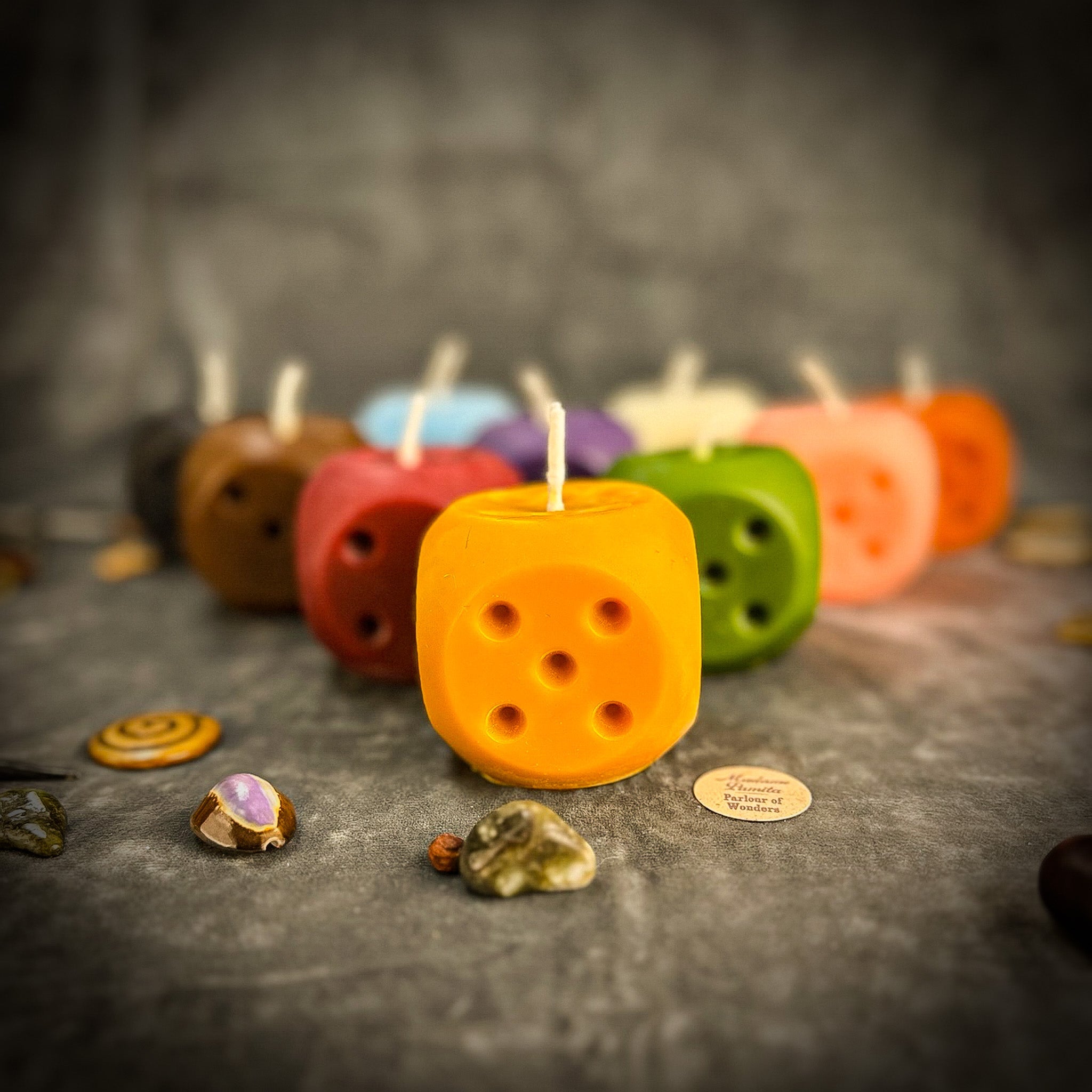Beeswax Lucky Dice Spell Candle by Parlour of Wonders with yellow wax, symbolizing gambling luck and good fortune.