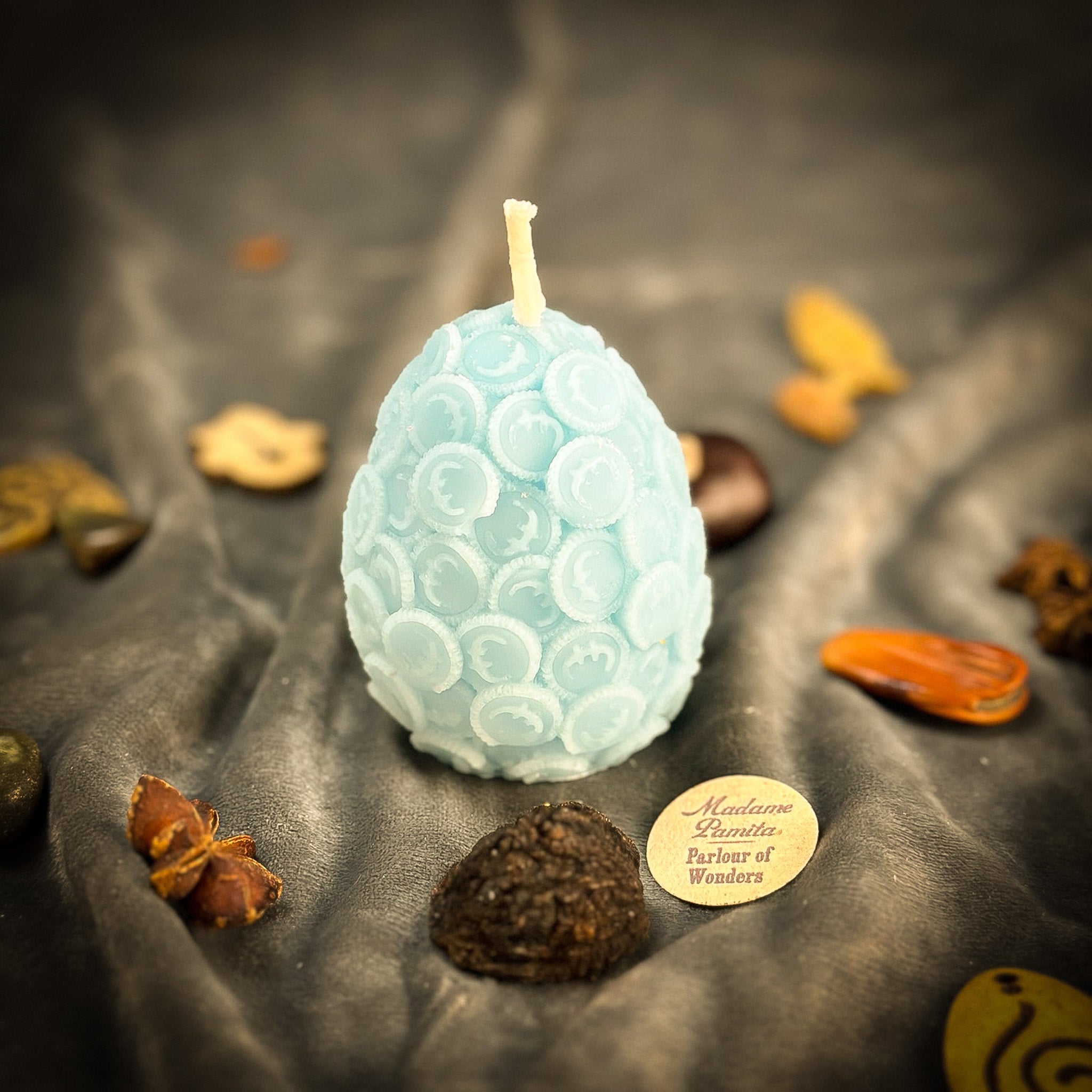 Parlour of Wonders beeswax nest egg spell candle in yellow for financial security and savings, featuring a natural beeswax finish.