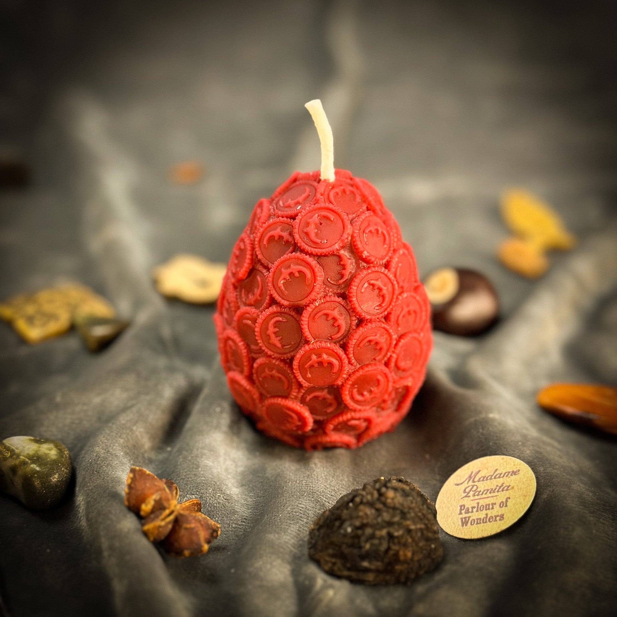 Yellow beeswax nest egg candle by Parlour of Wonders, symbolizing savings and financial security, shaped like an egg.