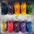Yellow beeswax candle with a gargoyle design, used for protection and guardian magic by Parlour of Wonders.