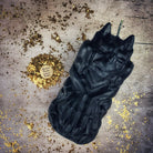 Yellow beeswax candle with a gargoyle protector design by Parlour of Wonders, used for guardian and protection magic.