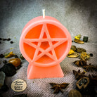 Yellow beeswax candle with pentacle of protection design, symbolizing spiritual safety and five elements for protective spells.