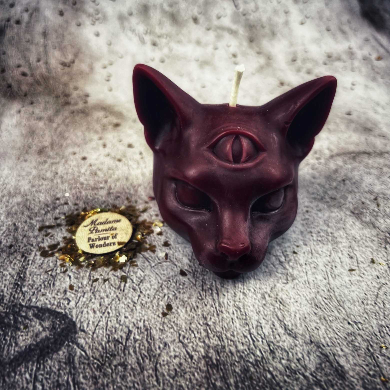 Yellow beeswax psychic cat spell candle by Parlour of Wonders, featuring a feline design for intuition and clairvoyance magic.