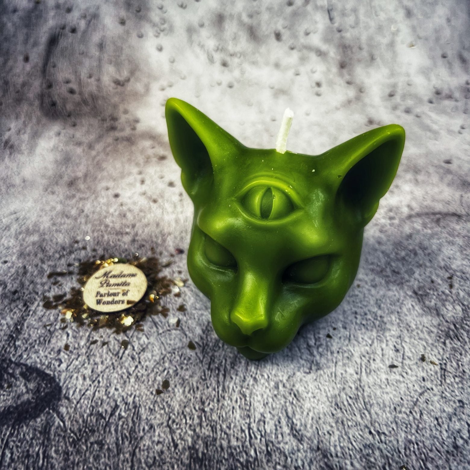 Yellow beeswax psychic cat spell candle from Parlour of Wonders for intuition and clairvoyance magic, featuring a detailed cat design.