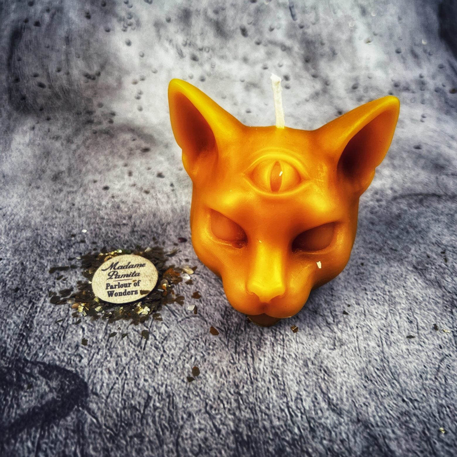 Yellow beeswax psychic cat spell candle by Parlour of Wonders, designed for intuition and clairvoyance magic.