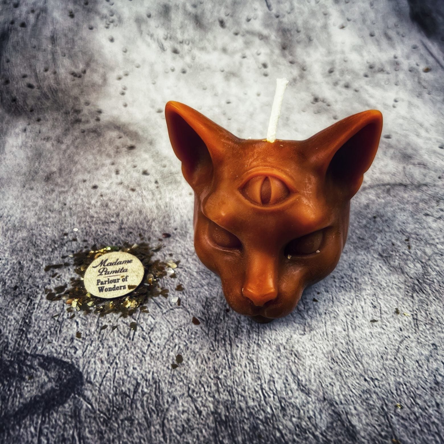 Yellow beeswax psychic cat spell candle by Parlour of Wonders, designed for intuition and clairvoyance magic.