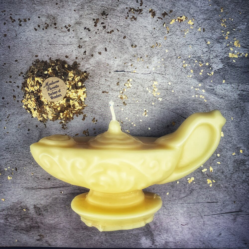 Yellow beeswax Aladdin's lamp spell candle by Parlour of Wonders, designed for wish manifestation and magic rituals.