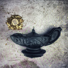 Yellow beeswax Aladdin's lamp spell candle by Parlour of Wonders, designed for wish manifestation and magic rituals.