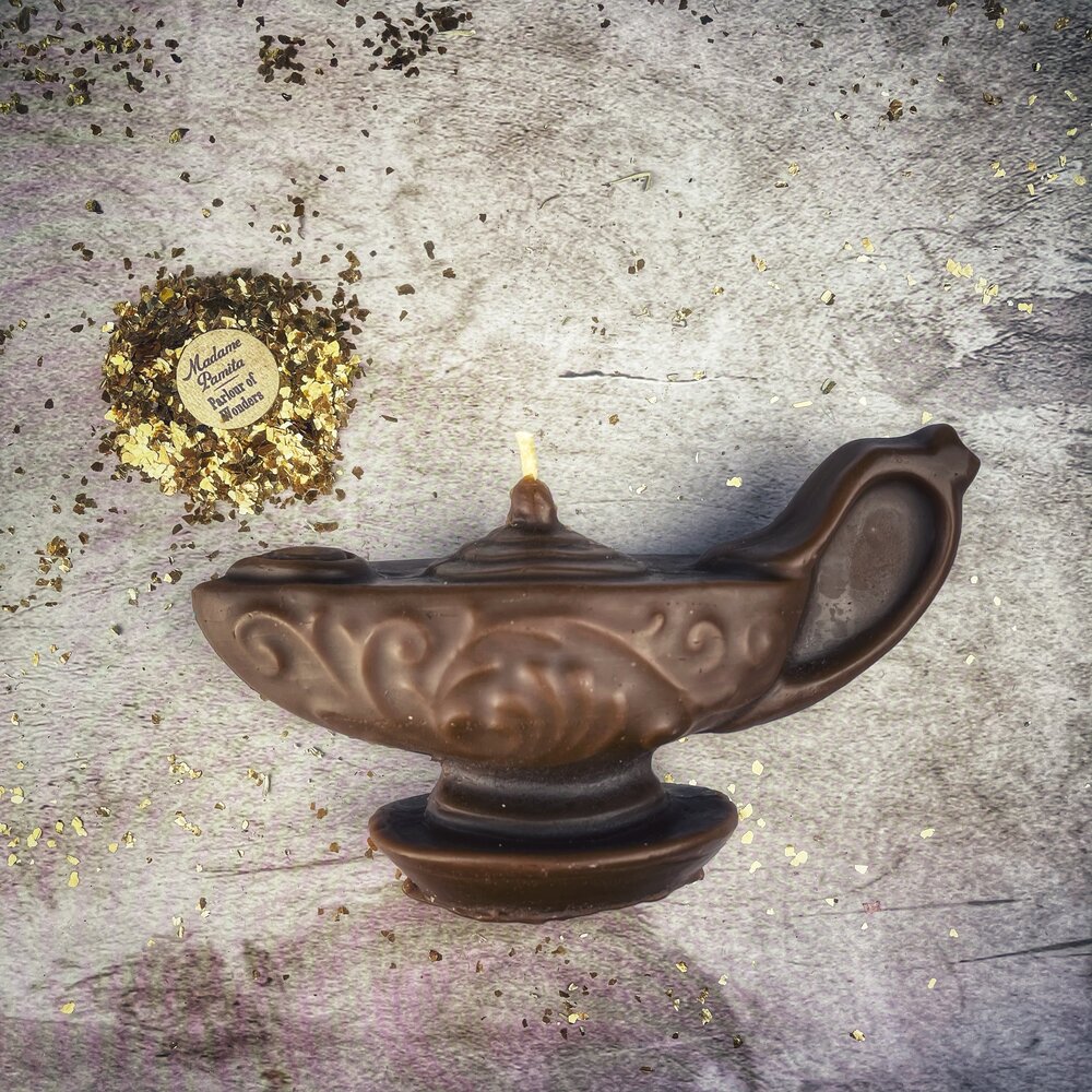 Yellow beeswax Aladdin's lamp spell candle by Parlour of Wonders, designed for wish manifestation and magic rituals.