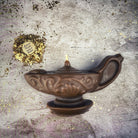 Yellow beeswax Aladdin's lamp spell candle by Parlour of Wonders, designed for wish manifestation and magic rituals.
