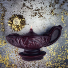 Yellow beeswax Aladdin's lamp spell candle by Parlour of Wonders, used for wish manifestation and magic rituals.