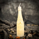 Yellow beeswax candle from Parlour of Wonders for success and celebration, featuring a luxurious champagne-inspired design.