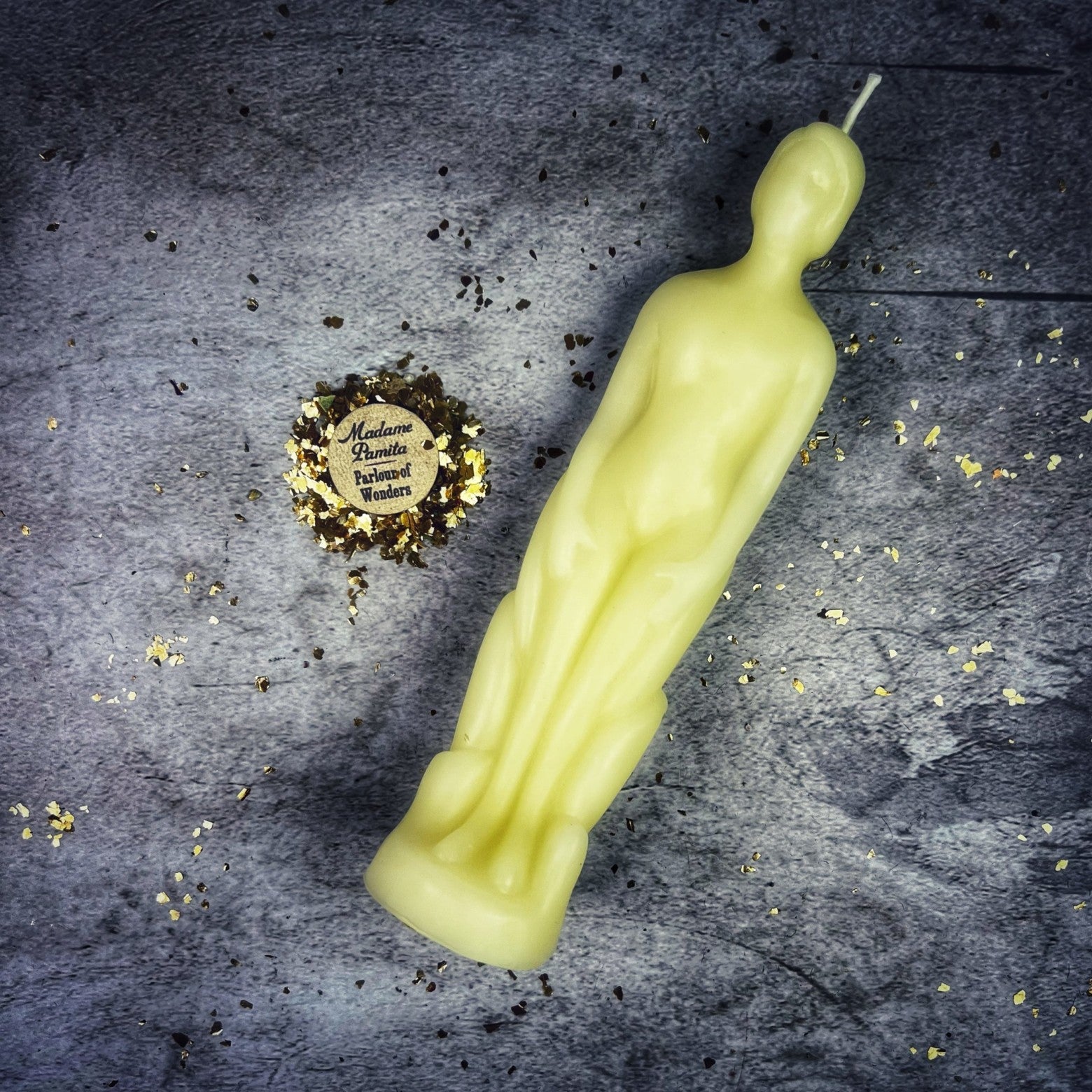 Yellow beeswax human figural spell candle for personal empowerment and intention magic, by Parlour of Wonders.