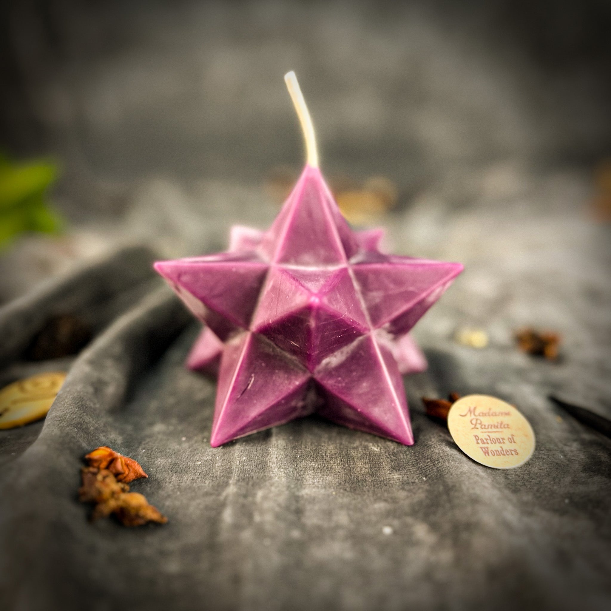 Yellow beeswax pentagram Merkaba candle by Parlour of Wonders, featuring sacred geometry symbols for protection and spiritual ascension.