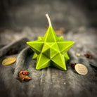 Yellow beeswax candle with pentagram and merkaba symbols, designed for protection, ascension, and sacred geometry rituals.