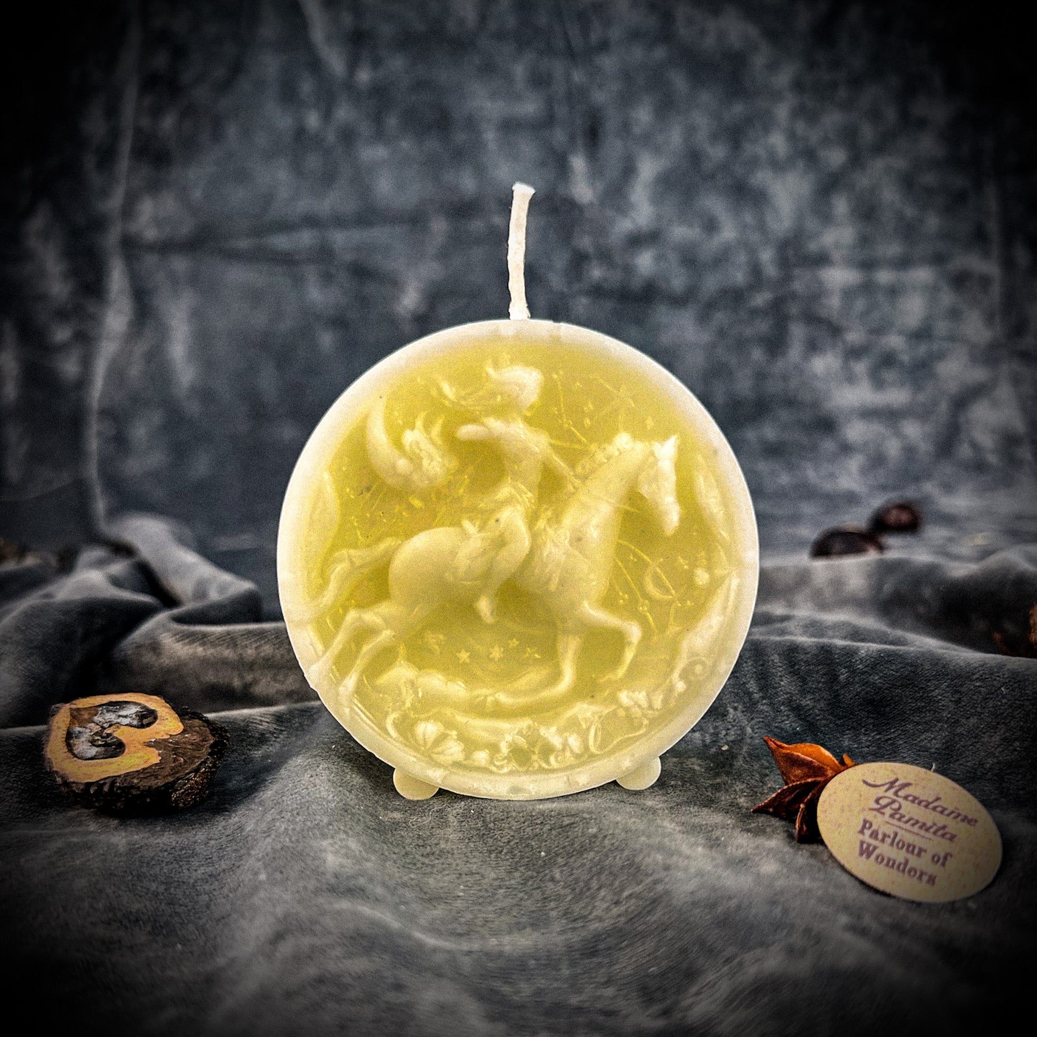 Yellow beeswax Sagittarius Archer zodiac spell candle by Parlour of Wonders, featuring celestial symbols for adventure, wisdom, and optimism.