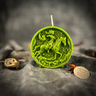 Yellow beeswax Sagittarius Archer zodiac spell candle by Parlour of Wonders, featuring intricate zodiac symbols for wisdom and optimism.