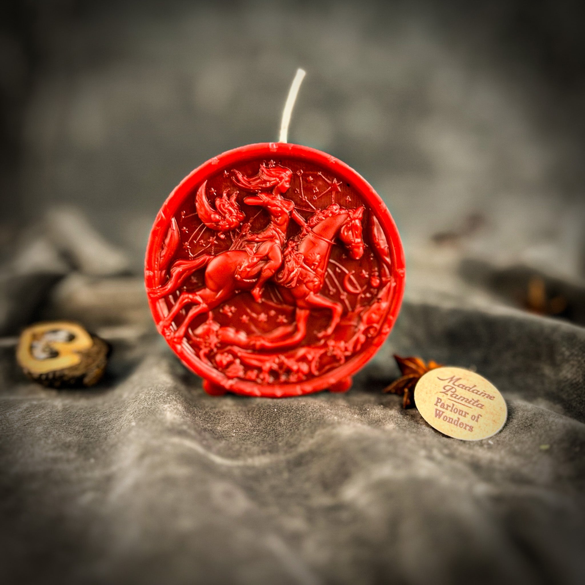 Yellow beeswax Sagittarius Archer zodiac spell candle by Parlour of Wonders, featuring a detailed archer design for adventure and wisdom.