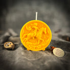 Yellow beeswax Sagittarius Archer zodiac spell candle by Parlour of Wonders, featuring earthy design representing adventure, wisdom, and optimism.