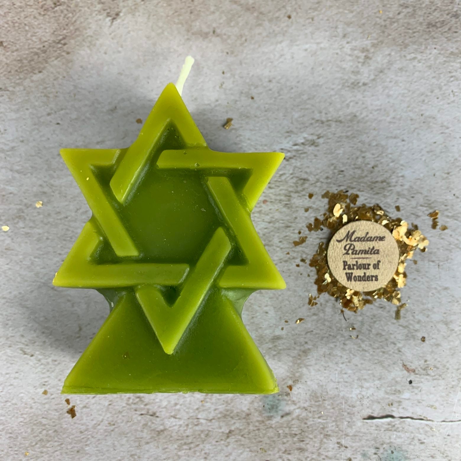 Yellow beeswax Seal of Solomon spell candle by Parlour of Wonders, featuring intricate design for protection and divine power.