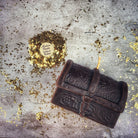 Yellow beeswax treasure chest spell candle by Parlour of Wonders for unlocking blessings and abundance magic.