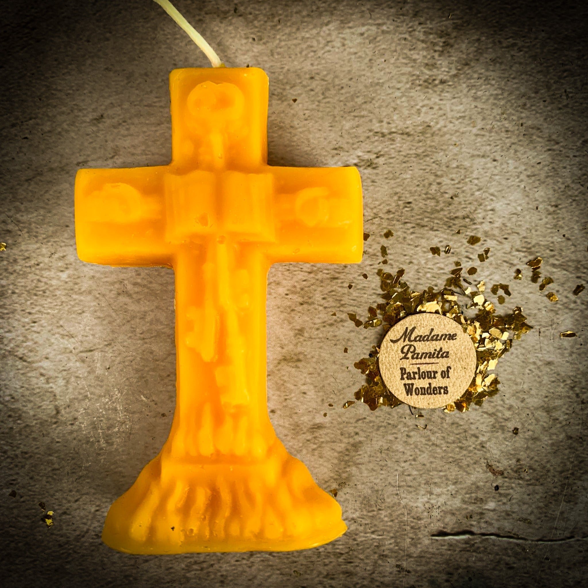 Yellow beeswax uncrossing spell candle from Parlour of Wonders, used for removing hexes, curses, and jinxes.