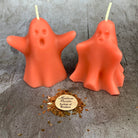 Set of yellow beeswax candles featuring ghost-shaped designs for spirit guide and ancestor magic rituals, by Parlour of Wonders.