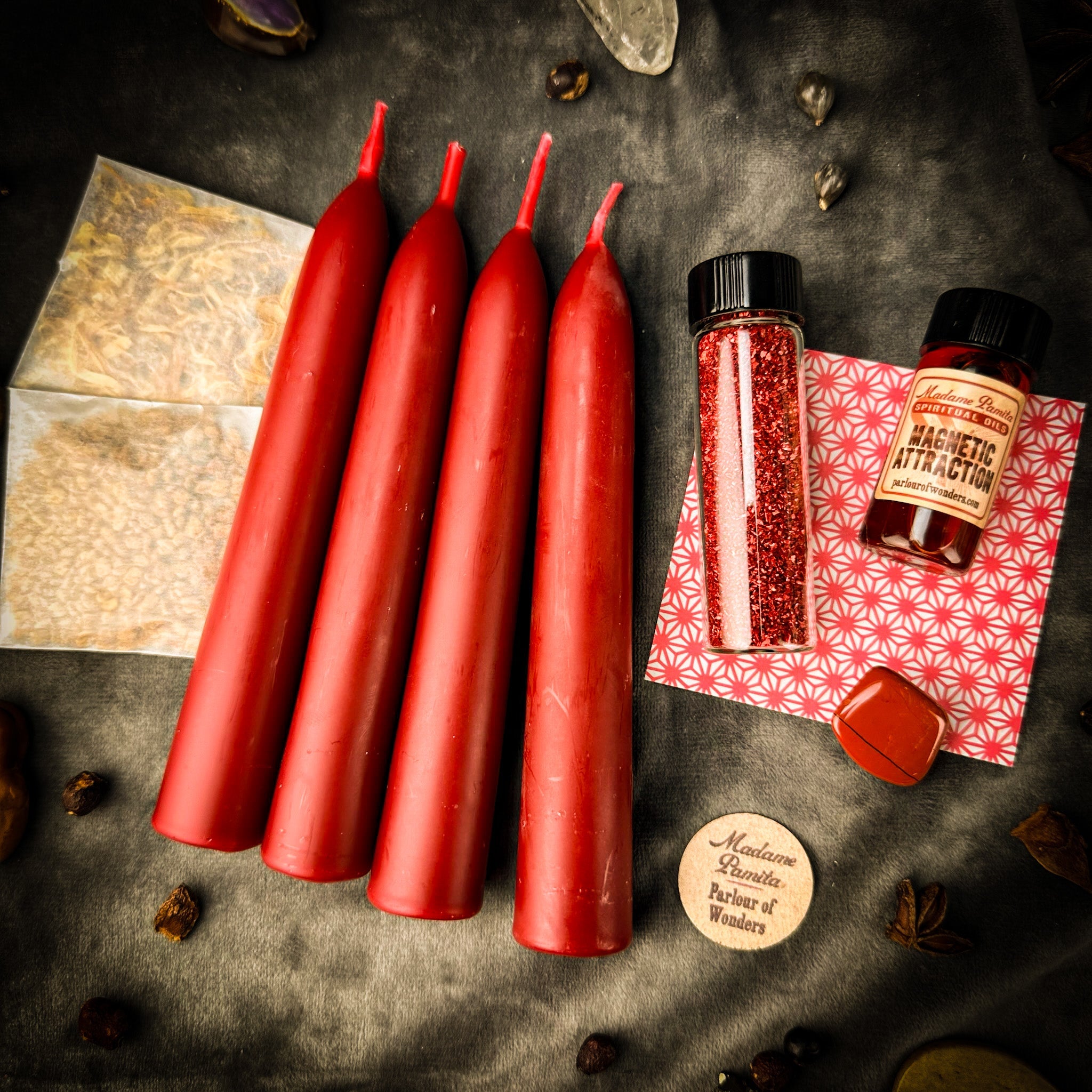 Parlour of Wonders Attraction Candle Spell Booster Pack with herbs and crystals to enhance magnetism in candle spell rituals.