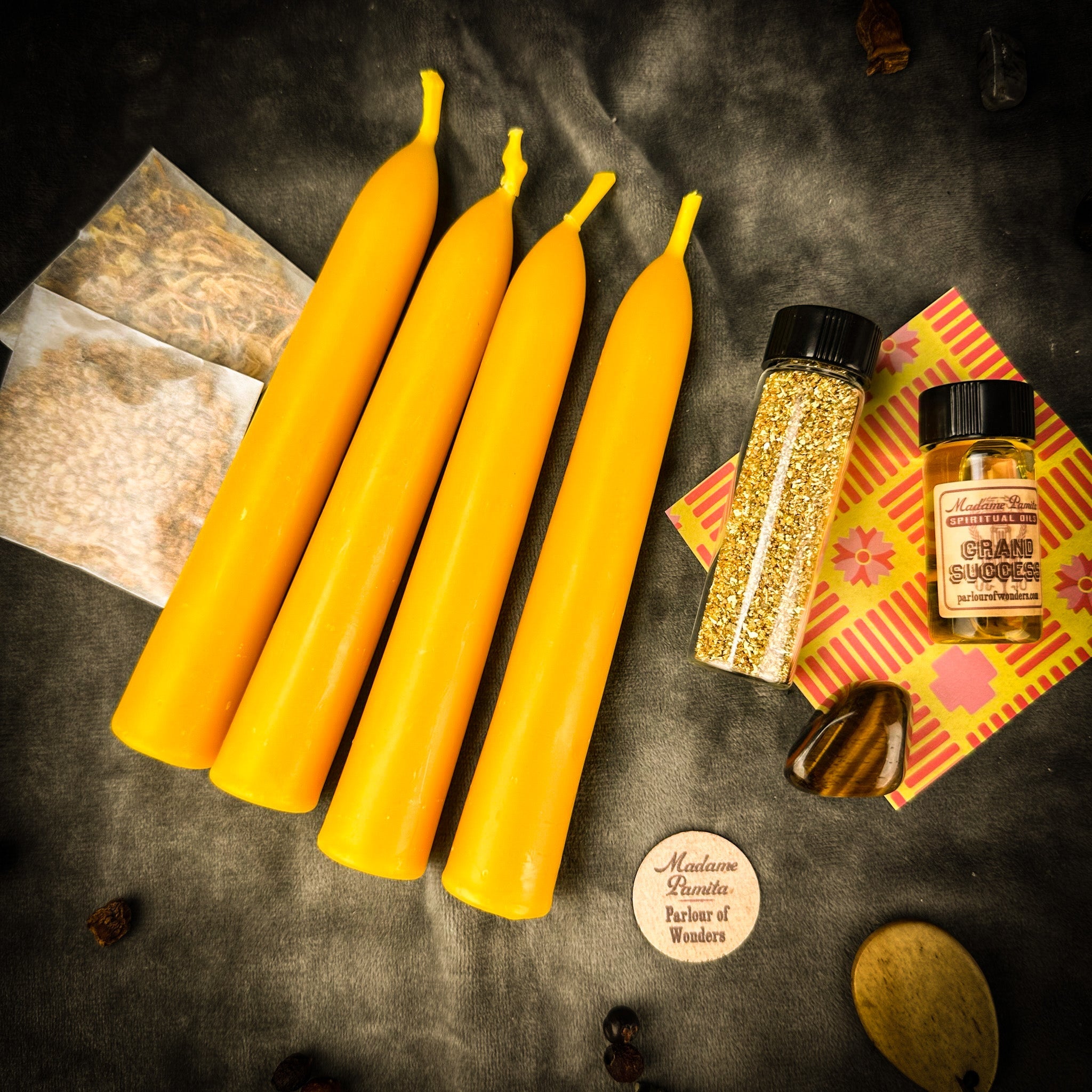 Triumph Candle Spell Booster Pack by Parlour of Wonders, featuring candles and herbs to add victory and success to spell kits.