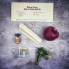 Apple of Avalon Candle Spell Kit by Parlour of Wonders with black candles and magical symbols for love, abundance, and ancient magic.