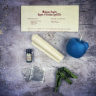 Apple of Avalon Candle Spell Kit by Parlour of Wonders with black control candles and magical symbols for love and abundance spells.