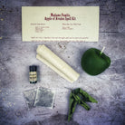 Apple of Avalon Candle Spell Kit by Parlour of Wonders, featuring black candles and magical symbols for love and abundance spells.
