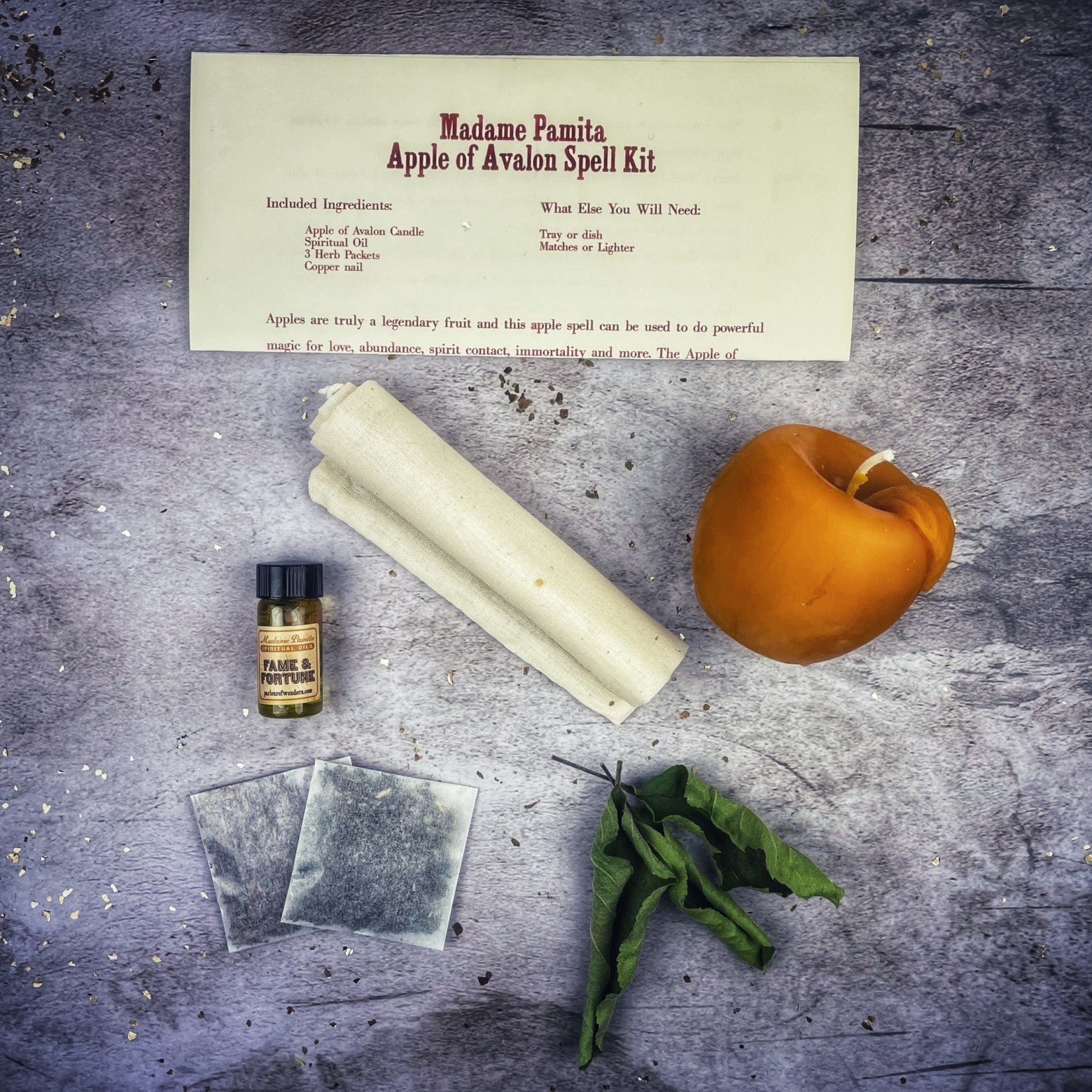 Parlour of Wonders Apple of Avalon Candle Spell Kit with black candles, herbs, and magical tools for love, abundance, and ancient magic.