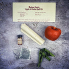 Parlour of Wonders Apple of Avalon Candle Spell Kit with black candles and mystical symbols for love, abundance, and ancient magic.