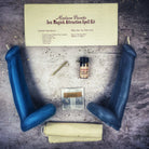 Black candle spell kit for passion and desire, featuring phallus imagery, from Parlour of Wonders for sex magick rituals.