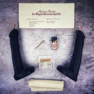 Black candle spell kit by Parlour of Wonders featuring a phallus design for passion and desire magic rituals.