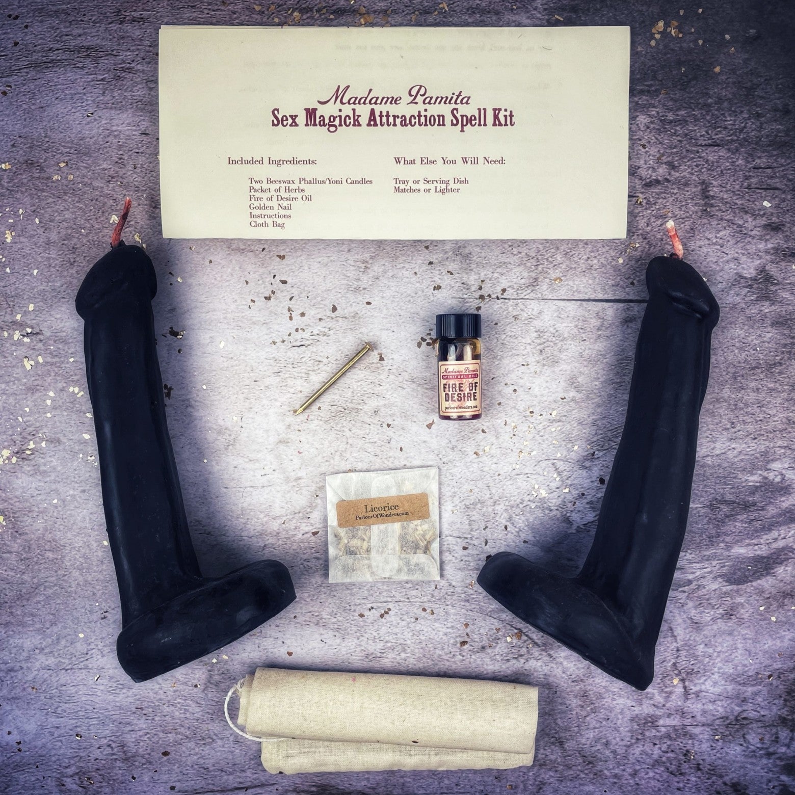 Black candle spell kit by Parlour of Wonders featuring a phallus design for passion and desire magic rituals.