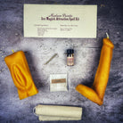 Parlour of Wonders sex magick candle spell kit featuring black candles with Yoni and Phallus symbols for passion and attraction spells.