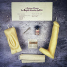 Black candle spell kit from Parlour of Wonders featuring Yoni and Phallus symbols for passion and attraction magic.