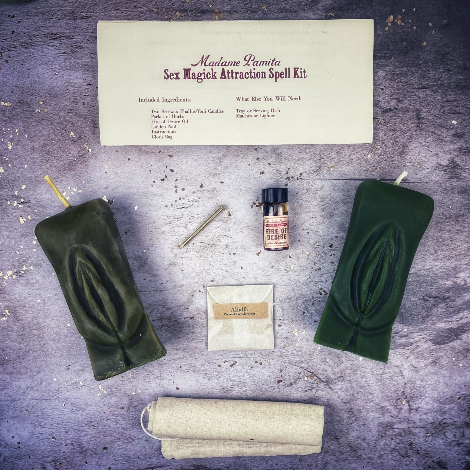 Black candle spell kit for passion and desire by Parlour of Wonders, featuring a Yoni-themed candle for sex magick rituals.
