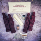 Deluxe Candle Spell Kit for female/female separation and peace, including black candles and love direction tools from Parlour of Wonders.