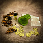 Lucky Money Frog Candle Spell Kit by Parlour of Wonders, featuring black candles and prosperity symbols for abundance and protection.