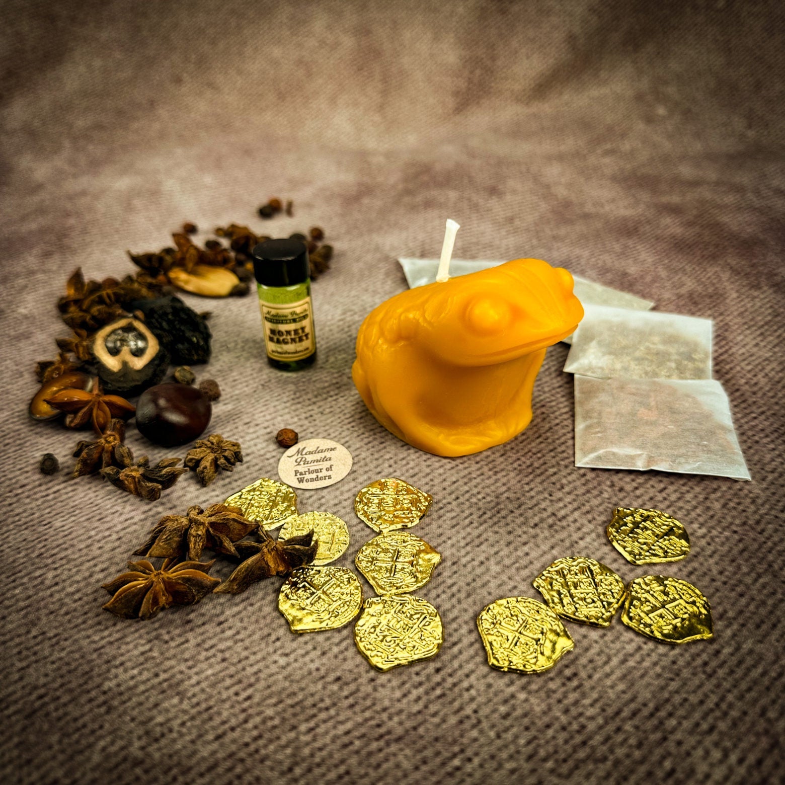 Parlour of Wonders Lucky Money Frog Candle Spell Kit for abundance and prosperity, featuring black candles and ritual accessories.