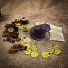 Lucky Money Frog Candle Spell Kit by Parlour of Wonders for abundance and prosperity, featuring black candles and ritual tools.