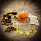 Lucky Money Frog Candle Spell Kit by Parlour of Wonders for abundance and prosperity, featuring a black candle and ritual tools.